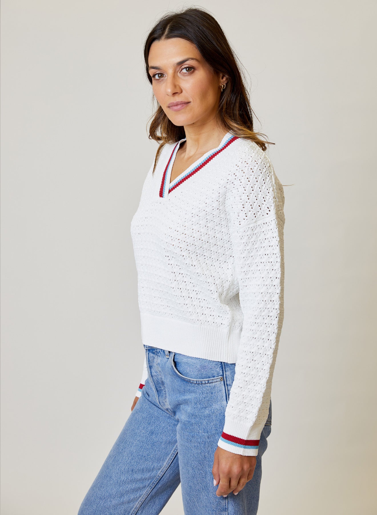 White V-Neck Sweater with Red and Blue Detail